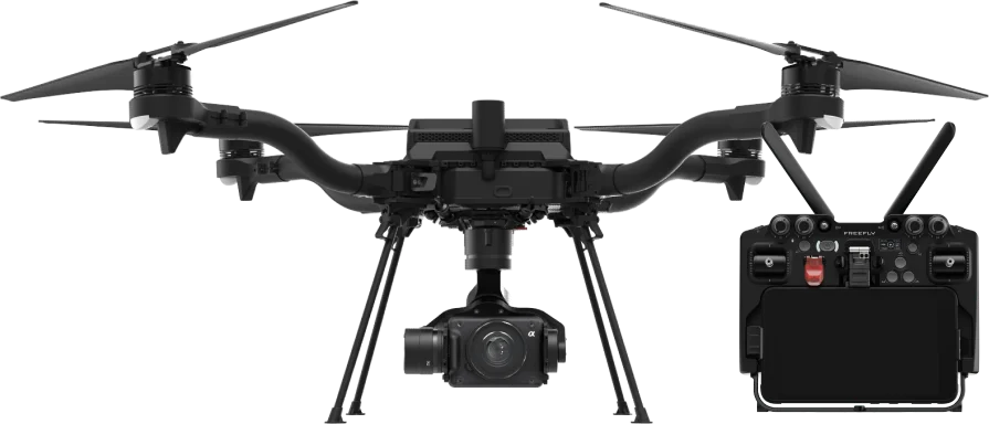 Freefly Astro commercial quadcopter with a Sony mapping camera mounted beneath it and a ground controller alongside